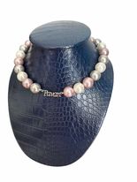 Identity: Signature pearl necklace: Custom center piece just for you