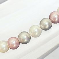 Identity: Signature pearl necklace: Custom center piece just for you